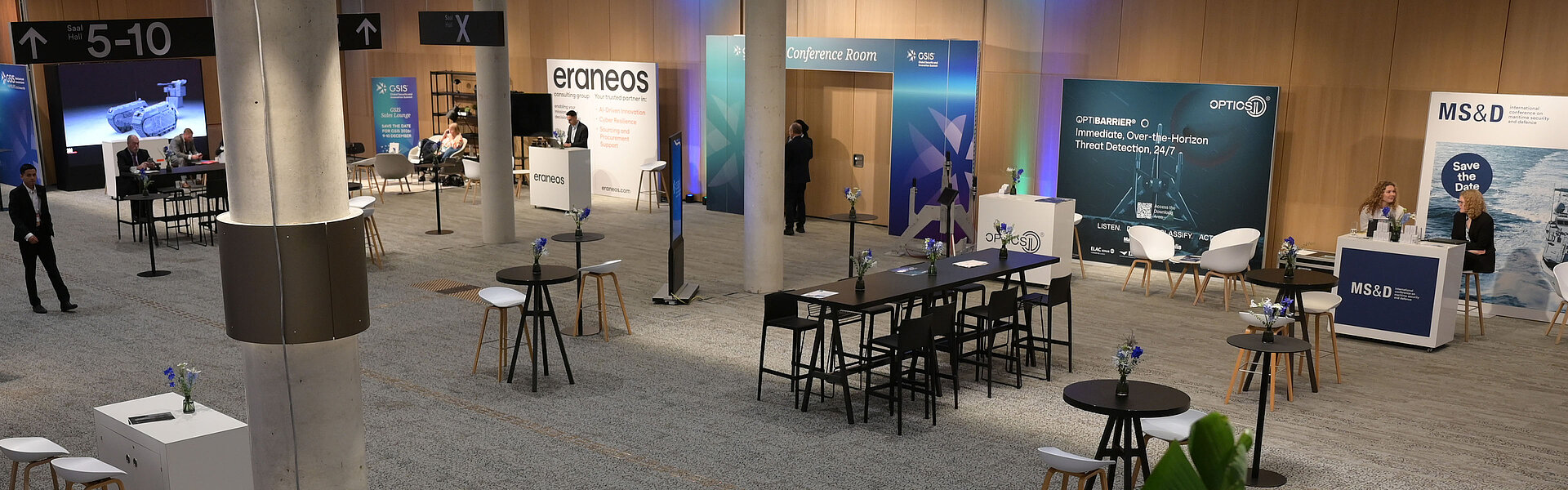 GSIS 2025 exhibition area before opening, with exhibition stands, tables and chairs in the modern CCH.
